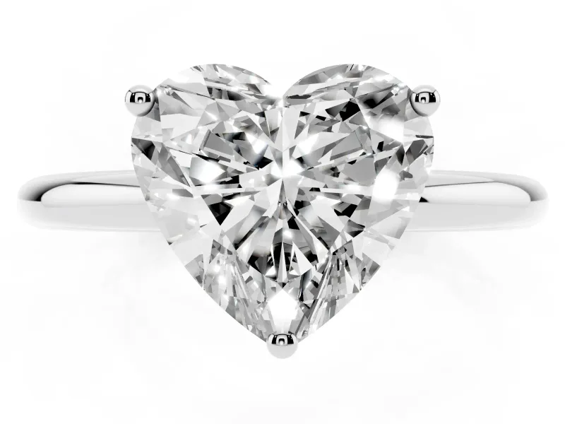 Heart Cut Diamond Solitaire Engagement Ring Set in Silver with Prong Setting and Polished Band