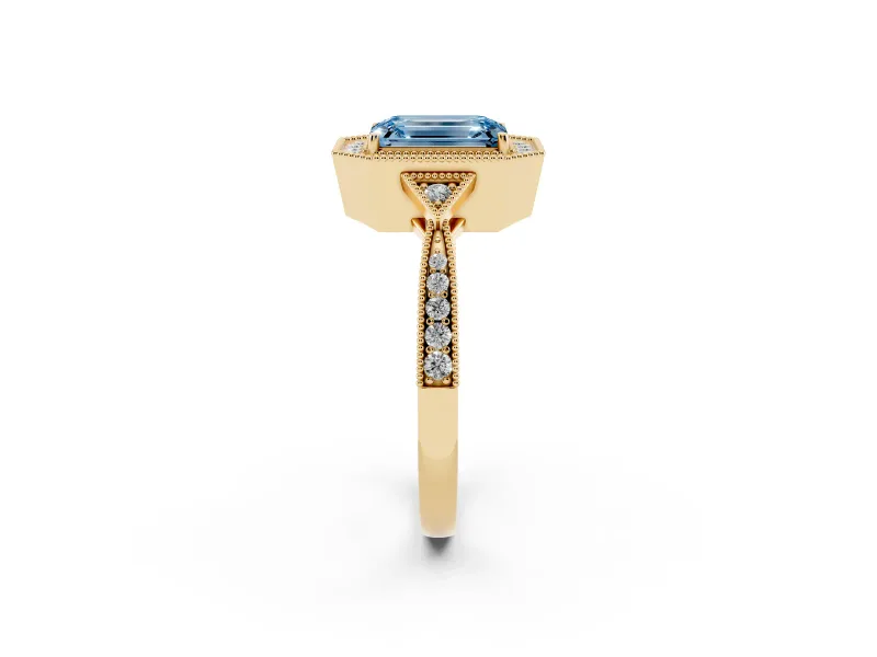 Fancy Blue Emerald Cut Diamond Halo Engagement Ring Set in Yellow gold with Milgrain Pavé Band