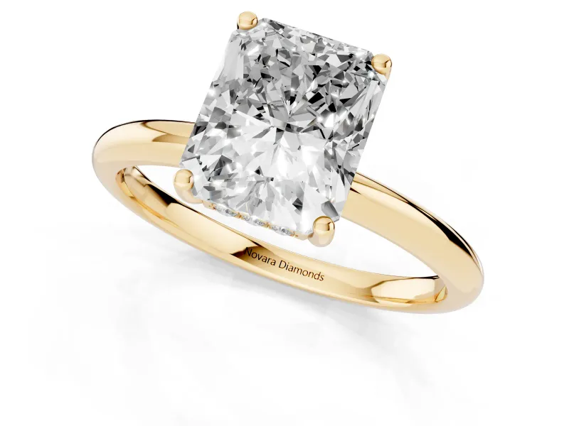 Radiant Cut Diamond Solitaire Engagement Ring Set in Yellow gold with Prong Setting and Polished Band