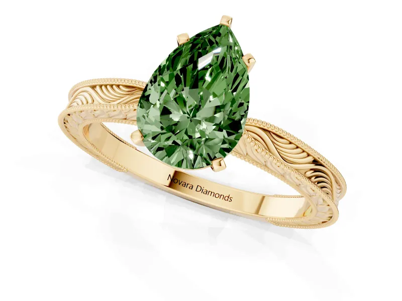 Fancy Green Pear Cut Diamond Solitaire Milgrain Engraved Band Set in Yellow gold with Prong Setting