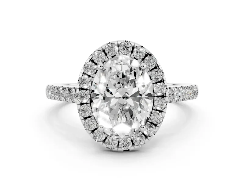 Oval Cut Diamond Pavé Halo Engagement Ring Set in White gold with Pavé Band and Prong Setting