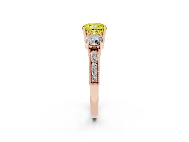 Fancy Yellow Cushion Cut Diamond Three-Stone Ring Set in Rose gold with Round Side Stones and Pavé Band