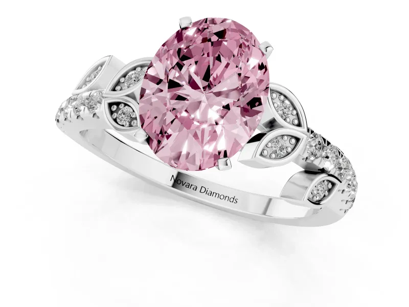 Fancy Pink Oval Cut Diamond Solitaire Leaf-Inspired Ring Set in Platinum with Pavé Band and Prong Setting