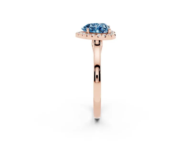 Fancy Blue Heart Cut Halo Round Diamond Solitaire Ring Set in Rose gold with Pavé Band and Prong Setting