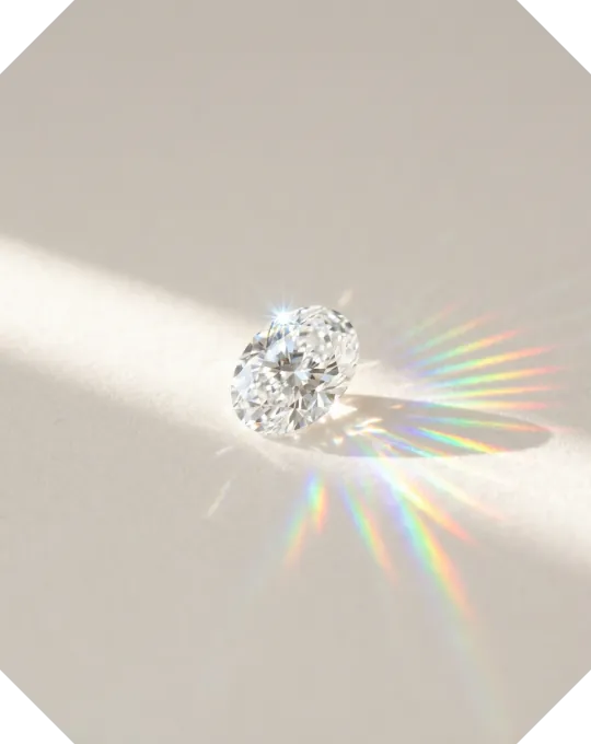 Light breaking into colour through a lab-grown diamond